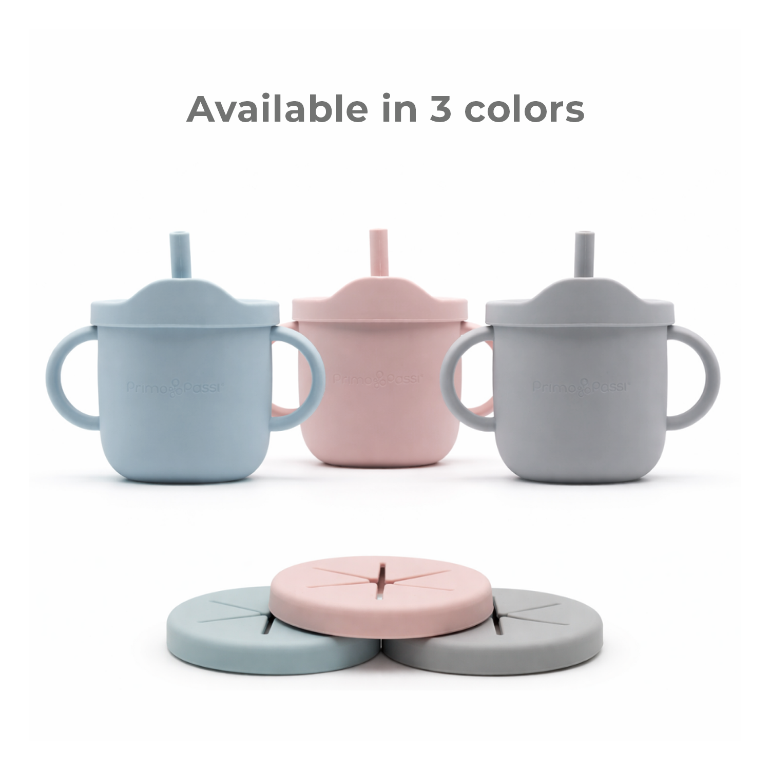 Three children's Baby holding a silicone training cup with a straw in blue, pink, and gray with lids on a white background.