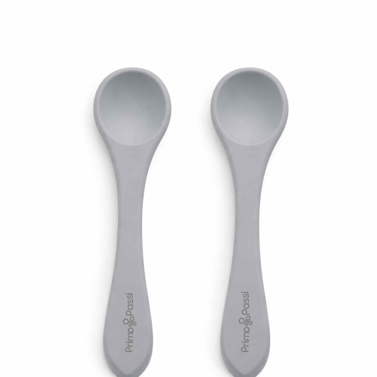 Two grey silicone baby spoons on a white background