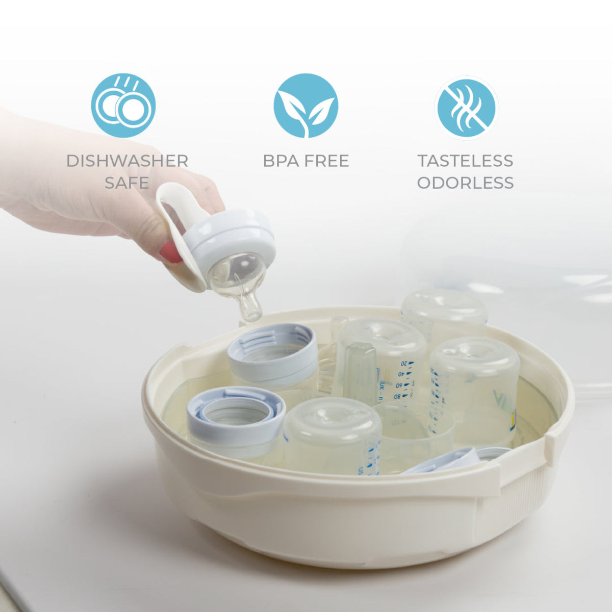 Primo Passi microwave steam sterilizer holding baby bottles and bottle parts while a hand places a bottle nipple inside, with dishwasher-safe, BPA-free, and tasteless/odorless feature icons on a white background.