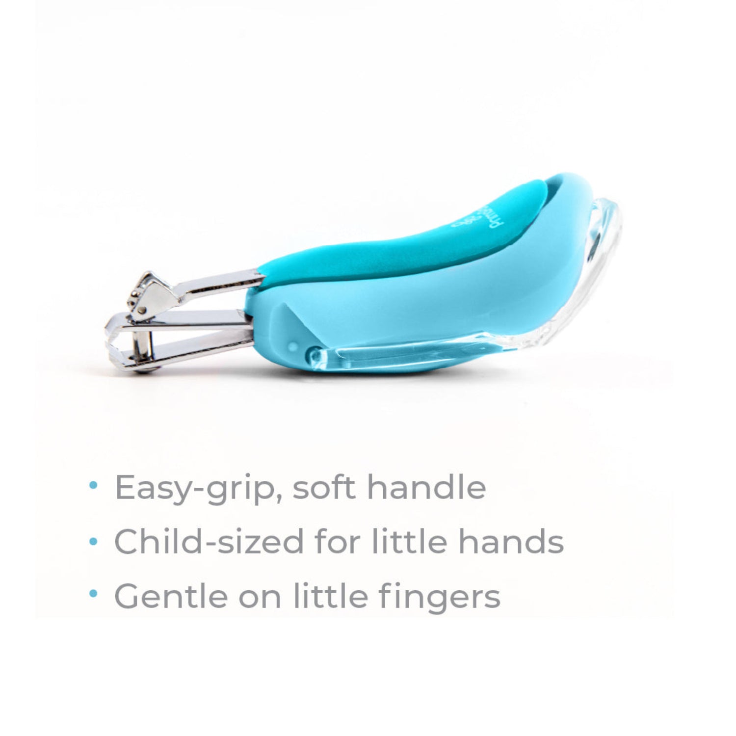 Primo Passi blue baby nail clipper with an ergonomic soft-grip handle and built-in 5x magnifying lens displayed on a white background. The side view showcases the compact, child-sized design, stainless steel clipper, and protective magnifier, with feature text highlighting the easy-grip handle, child-sized shape, and gentle design for little fingers.