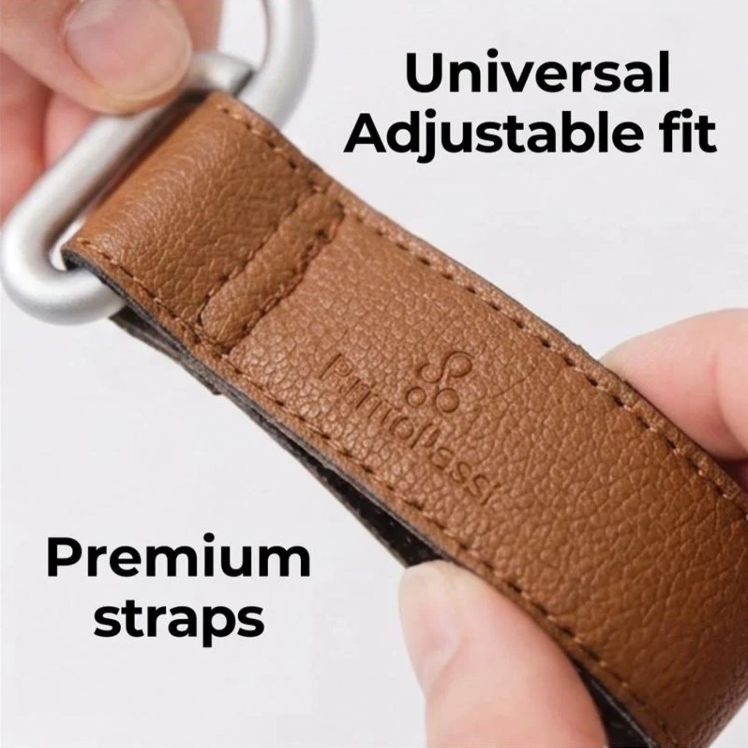 Brown leather strap with metal buckle held by hands, labeled 'Universal Adjustable fit' and 'Premium straps'.