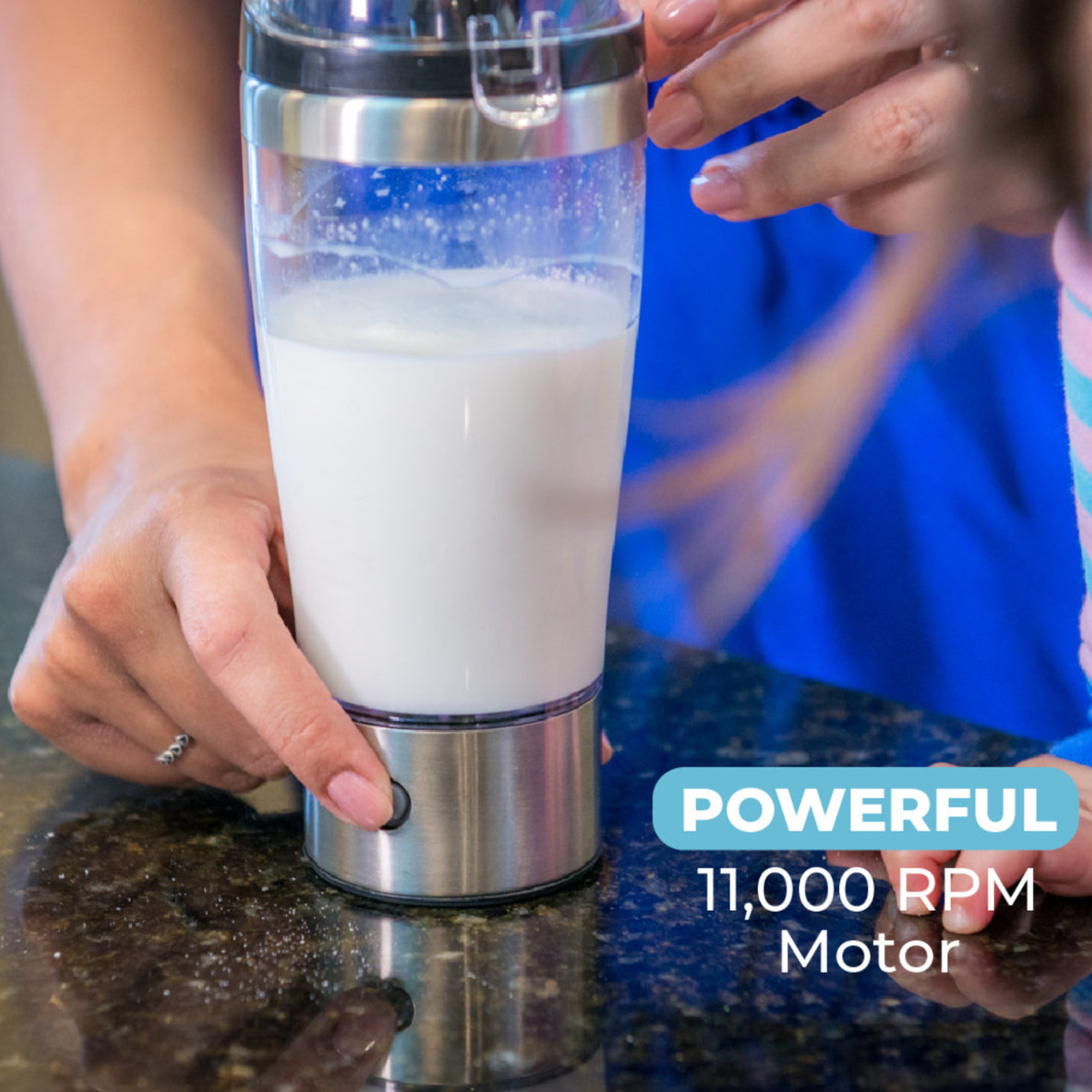 Parent using the Primo Passi portable electric formula mixer to quickly blend baby formula with the touch of a button. Featuring a powerful 11,000 RPM motor, the rechargeable mixer creates a smooth, lump-free bottle while helping reduce air bubbles for easier feeding at home or on the go.