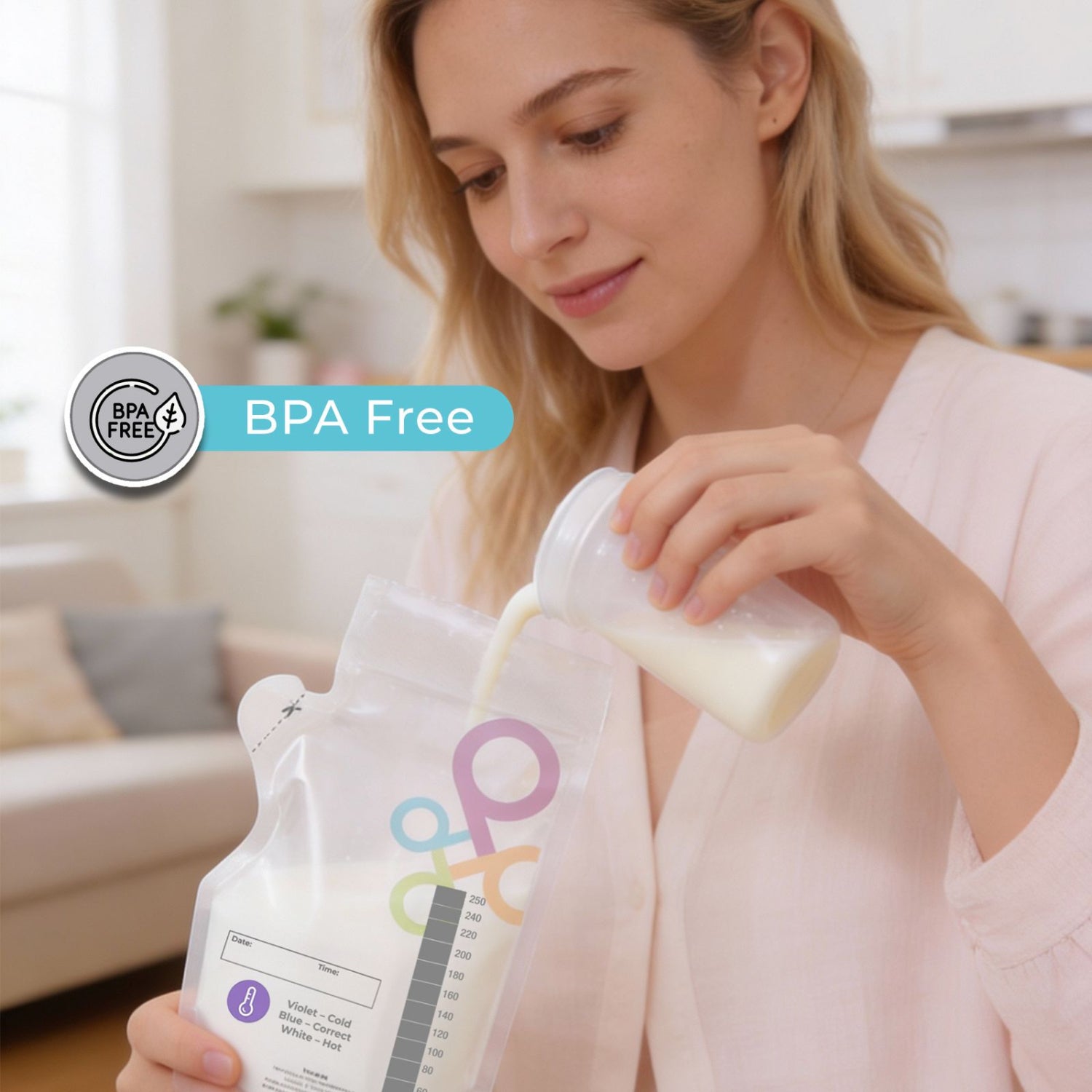 Woman pouring milk from a bottle into a breastmilk storage bag in a kitchen. text: BPA free