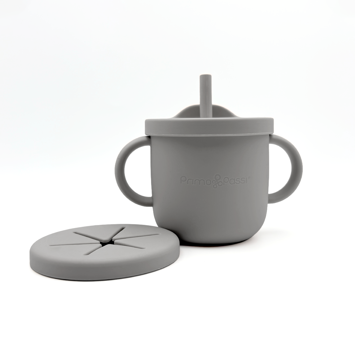 grey silicone training cup and snack cup with handle and straw lid on a white background