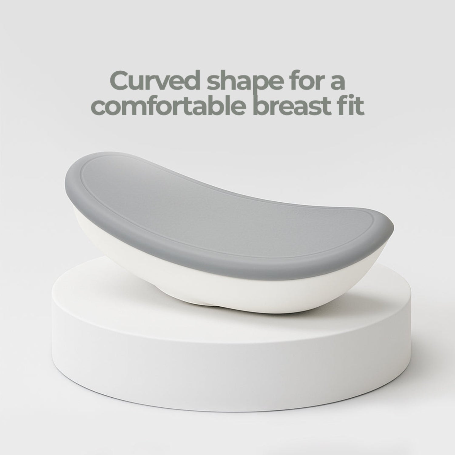 lactation massager device on a white background with text about a comfortable breast fit.