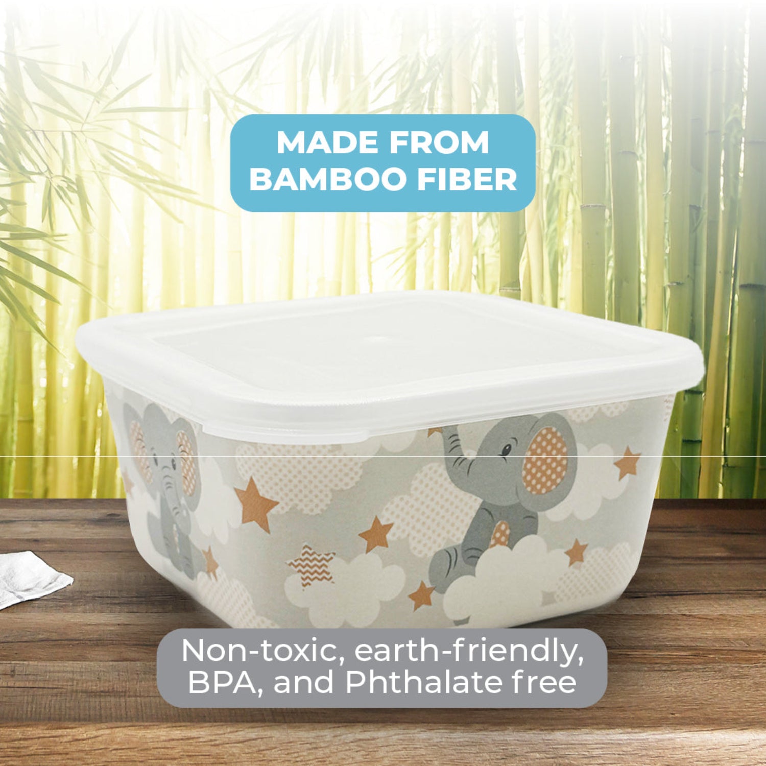 Bamboo fiber food storage container with a secure lid and playful elephant print on a wooden surface. Made from non-toxic, eco-friendly materials, this BPA- and phthalate-free container is perfect for storing baby meals and snacks.