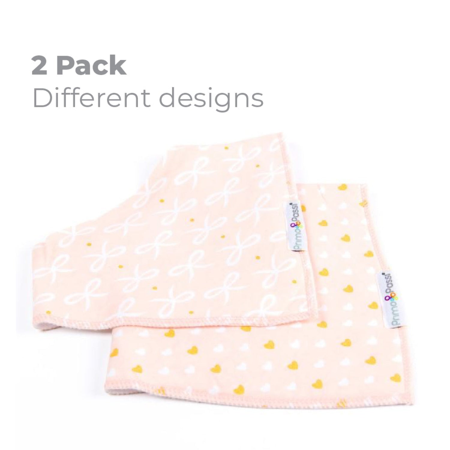 Two Primo Passi bandana bibs in a soft pink 2-pack featuring two unique designs—one with delicate white bows and the other with small yellow and white hearts. Made with an absorbent 100% cotton front and soft fleece backing to help keep babies dry and comfortable during teething and mealtime. Suitable for babies 0–9 months.