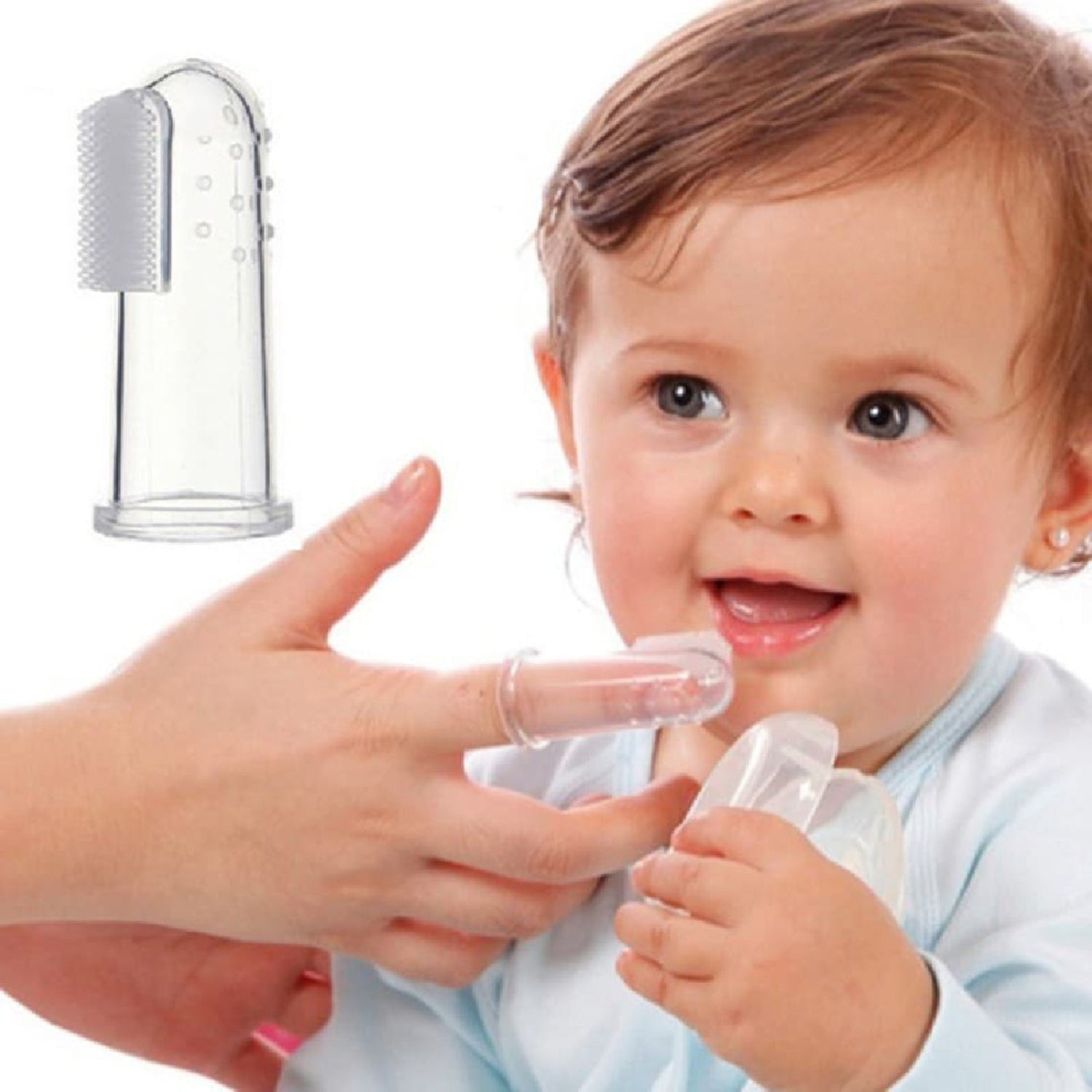 Parent using the Primo Passi silicone finger toothbrush to gently clean a baby's teeth and massage delicate gums. Made from 100% food-grade silicone with soft bristles, the finger brush fits securely over an adult finger for safe, effective oral care and early dental hygiene. Includes a protective storage case and is suitable for babies 3 months and older.