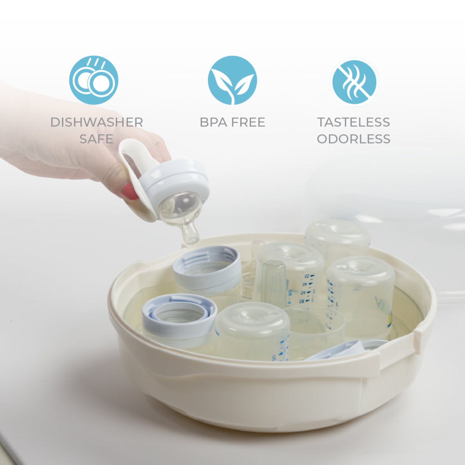 Primo Passi microwave steam sterilizer holding baby bottles and bottle parts while a hand places a bottle nipple inside, with dishwasher-safe, BPA-free, and tasteless/odorless feature icons on a white background.