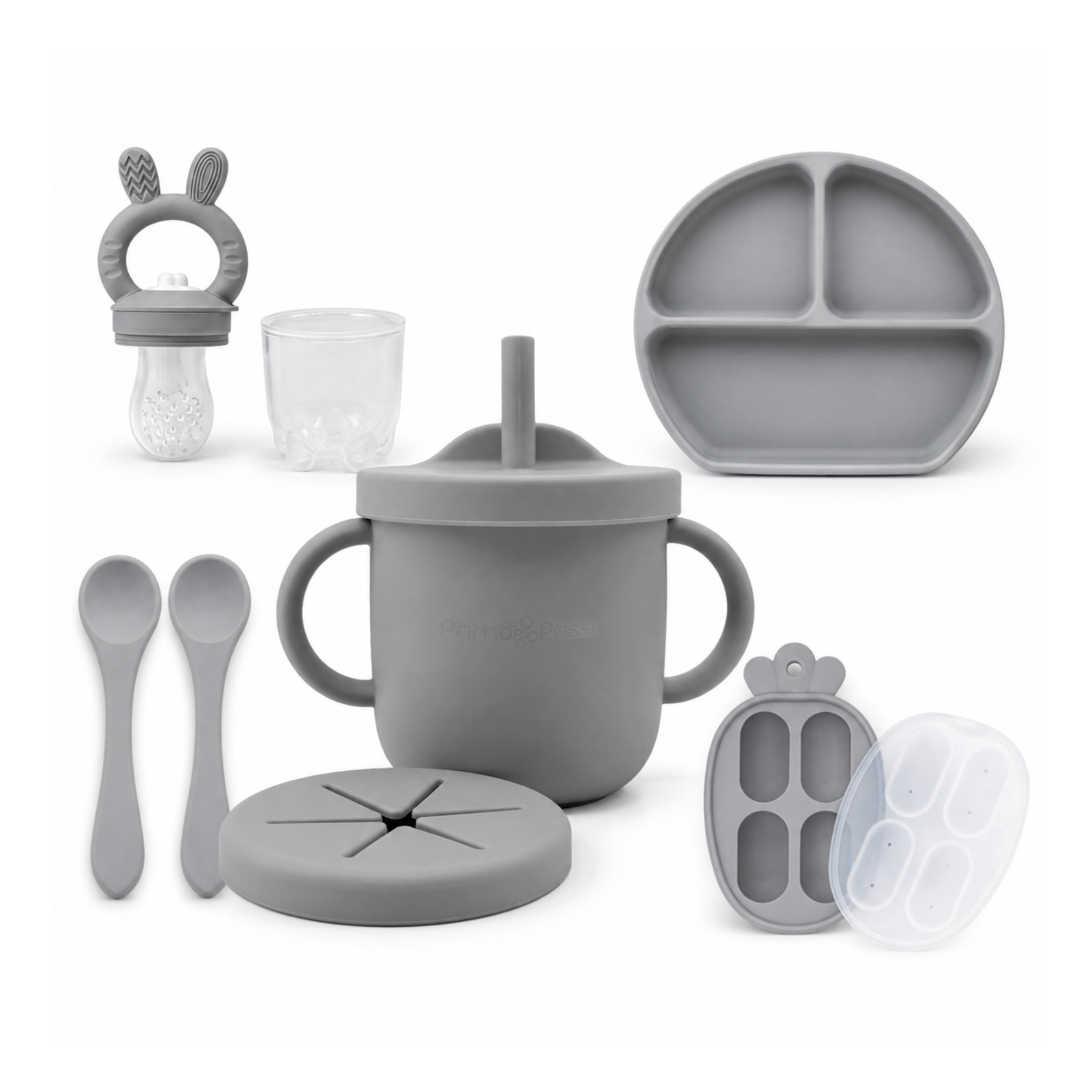 Set of gray silicone baby utensils including a cup, plate, and various other items on a white background.