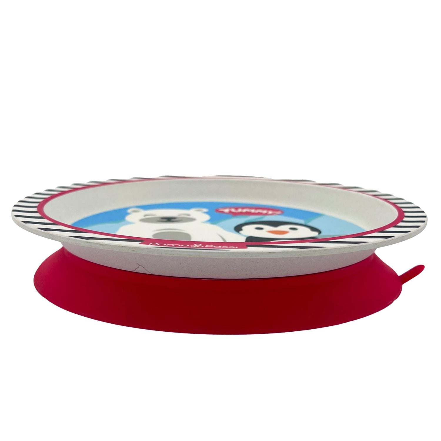 Round children's plate featuring a playful arctic-themed design with a smiling polar bear and a penguin holding a fish against snowy mountains. The plate has a black-and-white striped rim with red accents and is shown on a white background.