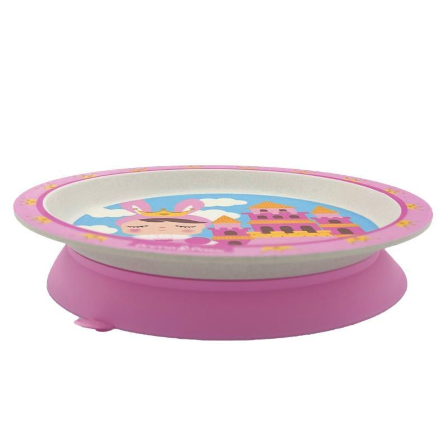 Round children's plate featuring a princess-themed design with a crowned character standing beside a pink and gold castle against a blue sky with clouds. The plate has a pink rim decorated with golden crowns and is shown on a white background.